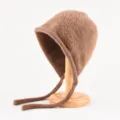 Brown plush knit bonnet hat for women, soft winter ear-flap warm cap with long ties. - One Size (56-59cm) / Brown