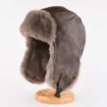 Vintage braune Leder Trapper Mütze, dicke warme Plüsch Winter Bombermütze mit Ohrenklappen. - Einheitsgröße / Braun