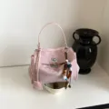 Pink suede top-handle crossbody bag for women, stylish minimalist satchel purse with charm. - Pink With Pendant
