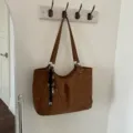 Brown PU leather shoulder tote bag, large capacity casual commuting handbag for women. - With Pendant / Brown