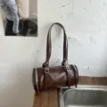 Bolso bandolera cilíndrico marrón vintage para mujer, bolso de almohada retro con doble correa. - Marrón