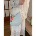 Light blue woven shoulder underarm bag for women, stylish casual daily commuting handbag. - With Pendant / Blue