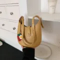 Yellow PU leather hobo shoulder bag with charming strawberry pendant for women stylish daily wear. - With Pendant / Yellow