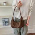 Vintage brown suede underarm bag for women, minimalist dumpling shoulder handbag. - Brown