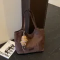 Vintage brown suede tote bag for women, large capacity shoulder bag with cute puppy charm. - With Pendant / Coffee