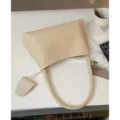 Minimalist beige woven leather shoulder bag, chic underarm handbag for women daily commuting style. - Off White