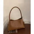 Brown woven leather shoulder bag, stylish underarm handbag with chic braided handle and knot. - Brown