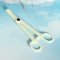 Disposable plastic body piercing clamp detail view, lightweight tool for tattoo and piercing work. - Round Mouth Opening Pliers