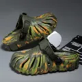 Detail view of army green orange camo hole shoes showing unique ribbed cutout upper design. - Women 35-36 / Camouflage Orange Green with Back Strap