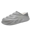 Graue gefütterte Winter-Clogs für Damen und Herren, warme wasserdichte Hausschuhe. - Graue Baumwollschuhe