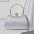 Sparkling rhinestone evening clutch bag with metal handle and pearl clasp for women. - Silver