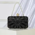 Black rhinestone evening clutch bag with pearl handle and floral crystal design for women. - Black