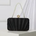 Black pleated evening clutch bag with pearl handle and metal clasp for formal party - Black