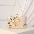 Elegant silk evening clutch bag with pearl handle and floral embroidery for women banquets. - Champagne