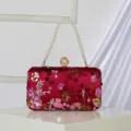 Red sequin evening clutch bag with elegant pearl handle and floral embroidery for parties. - Burgundy