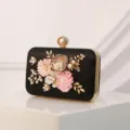 Elegant black evening clutch with handmade floral pearl decorations for women parties. - Black