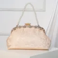 Champagne lace clutch handbag with elegant pearl handle and sparkling rhinestone clasp. - Champagne