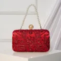 Elegant red embroidered evening clutch bag with pearl handle, perfect for weddings and parties. - Burgundy