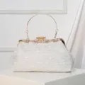 Elegant white lace evening clutch bag with rhinestone metal handle for bridal wedding dresses. - Silver