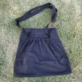 Outdoor black fabric foraging harvest bag detail view with adjustable strap and sturdy. - Black