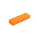 Detailed close-up view of the orange cleaning eraser block designed for kitchen scale removal. - Orange