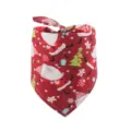 Close-up detail view of Christmas pet bandana with cute Santa print, soft cotton fabric. - Red Christmas Theme