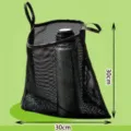 Detail of black stroller mesh hanging bag, lightweight pram storage pocket showing 30cm size. - Black