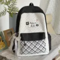 Chic black and white polka dot backpack for women, cute cat patch and bow, school bag. - With Charm / Black