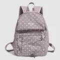 Stylish mini polka dot backpack for women, casual daily daypack with front pocket design. - L / Taro Purple
