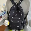 Casual black backpack with cute cat print, multi-pocket school bag for women and students. - With Charm / Black
