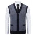 Close-up detail of men's knitted v-neck button cardigan vest paired with a white dress shirt. - L / Tops / Light Gray