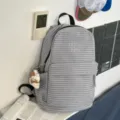 Grey striped casual backpack for women, Korean style school bookbag with pockets and pendant. - L / With Charm / Gray