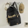 Black canvas student backpack with large capacity and big letters for casual travel daily use. - No Pendant / Black