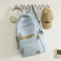 Retro large letter casual student backpack large capacity travel bag for men and women blue - No Pendant / Blue