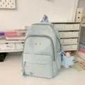 Light blue stylish school backpack with multi pockets, cute star embroidery and fluffy charm. - With Charm / S / Blue