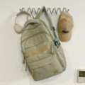 Vintage style student backpack in light green with star pattern and large letters for daily use - No Pendant / Green