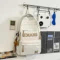 White student backpack casual large capacity rucksack with letter print fashion travel bag. - With Charm / White