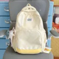 Zaino giallo con stampa farfalle, bordo di pizzo e ciondolo a stella per la scuola - Con Ciondolo / Giallo