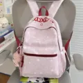 Pink star printed casual school backpack for women and students with cute plush pendant accessory - With Charm / Pink