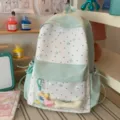 Cute mint green star print backpack variant, casual canvas school bookbag with clear front pocket. - With Star Bone Pendant / Green