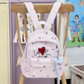 Sac à dos à carreaux roses avec broderie d'amour et pendentif, idéal pour l'école et les loisirs. - Petit (Avec Pendentif) / Rose