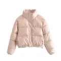 Detailed view of the beige cropped PU leather puffer jacket featuring high collar and snap buttons. - XS / Beige