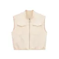 Close-up detail of cream faux leather vest featuring stand collar, full zip and pockets. - S / Beige