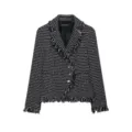 Black and white tweed blazer detail featuring fringe lapel and button closure close-up. - XS / Tops / Black