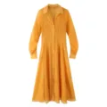 Details of the elegant yellow sheer long-sleeve V-neck shirt dress with textured fabric. - XS / Turmeric
