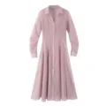 Close-up view of the pink long-sleeve shirt dress, sheer textured fabric and button details. - XS / Pink