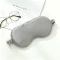 Grey silk sleep mask, breathable comfortable shading eye cover for travel home and office use. - True Grey