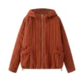 Women's hooded quilted zip-up jacket in terracotta, featuring vertical stitching and pockets. - M / Brick Red