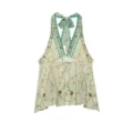 Detailed view of the stylish women's halter neck backless top with green tie-dye and gold sequins. - XS / Green