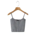 Detailed view of the gray knitted camisole featuring a V-neckline and front button closure. - S / Camisole